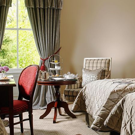 Muckross Park Hotel & Spa Kilclogherane Room photo A bedroom at the Killarney International Hotel